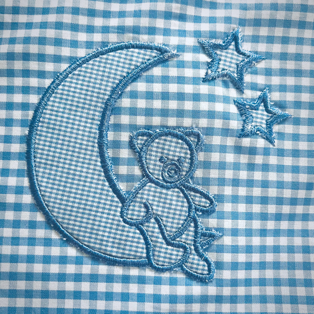 Wickelunterlage “Mond und Sterne” hellblau