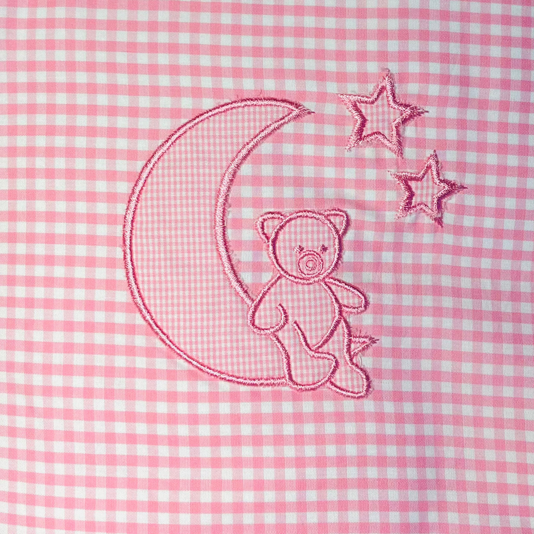 Wickelunterlage “Mond und Sterne” rosa